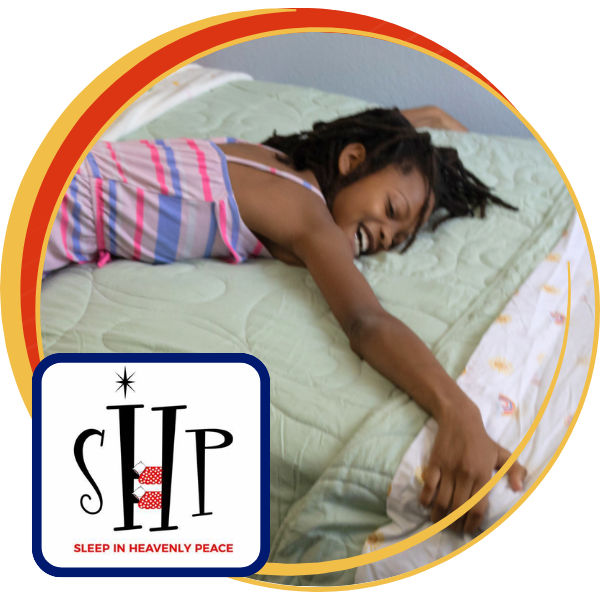 Circle frame of a girl laying on a bed with SHP logo.